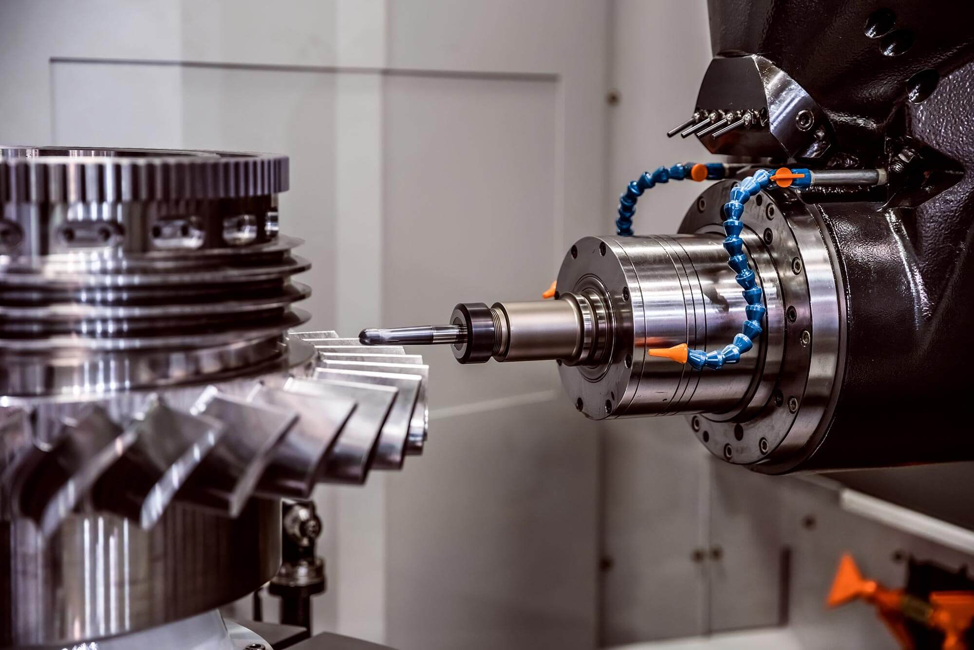 Five-axis CNC machining of precision metal component